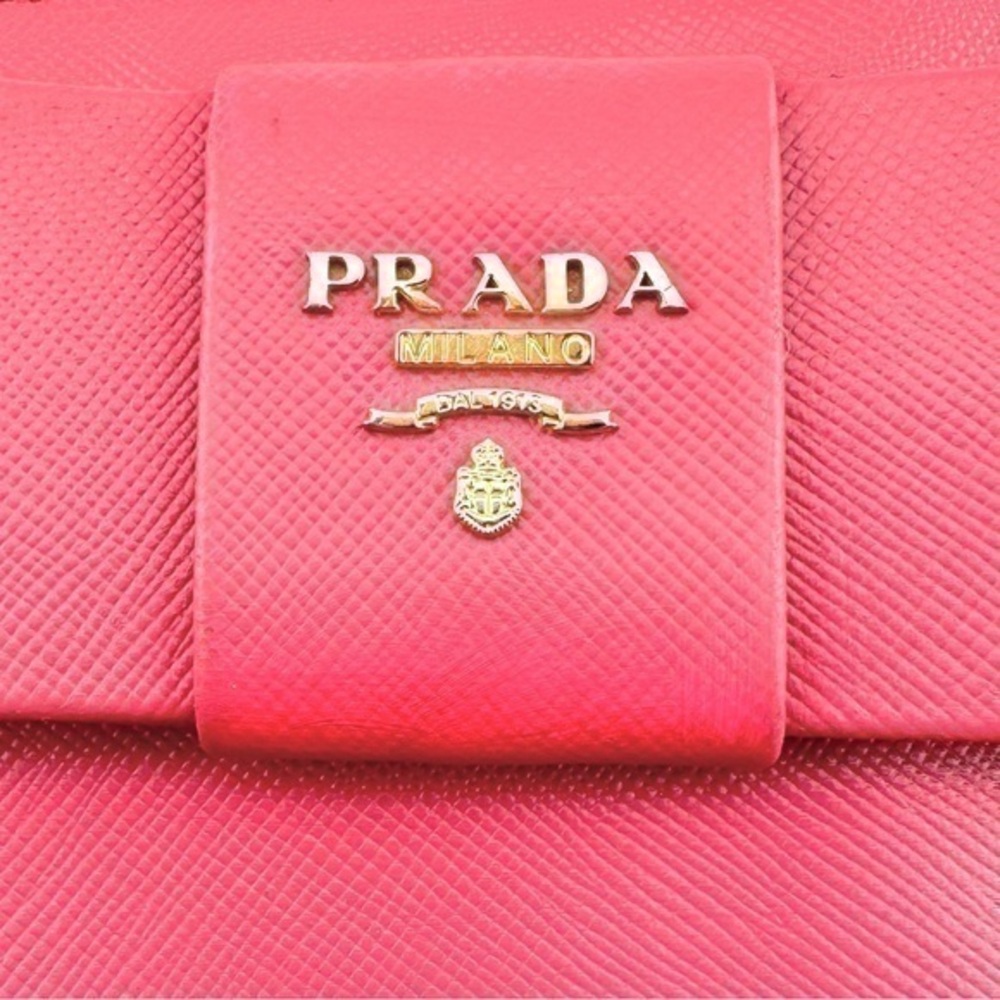 AUTHENTIC Prada Fiocco Bow Zip Around Wallet. Color: Peoria. - Picture 3 of 16